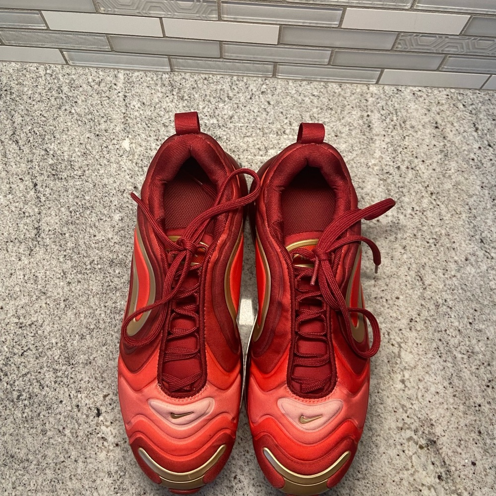 Nike AirMax size 6Y red and gold.  Very good condition, barely worn.